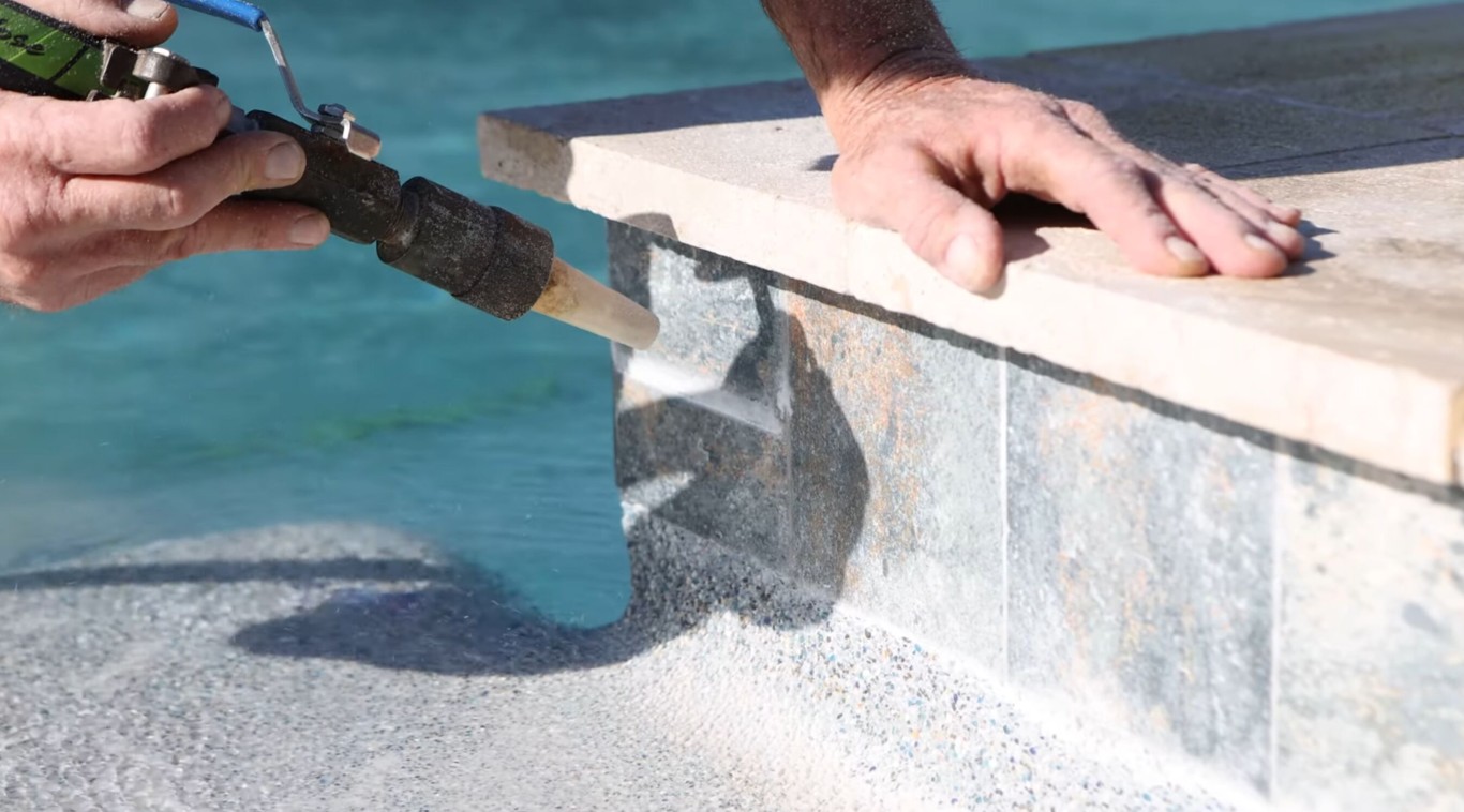 Professional pool tile cleaning and calcium removal in Wellington, FL